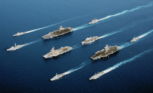 Navy Fleet on the ocean in sunshine